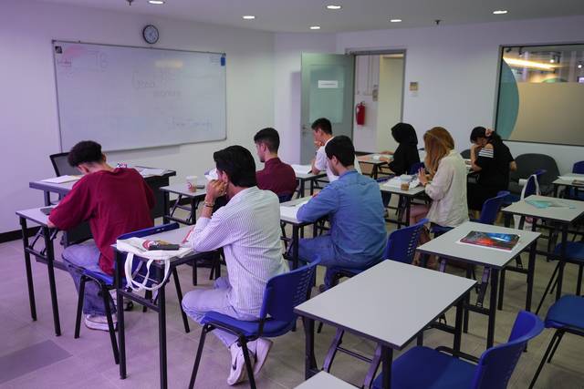 Students attending an English class at Cambright Language Centre